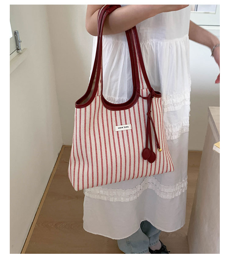 2025 Casual Commuter Tote bag, women's niche striped simple and fashionable hand-held shoulder bag, large-capacity underarm bag undefined