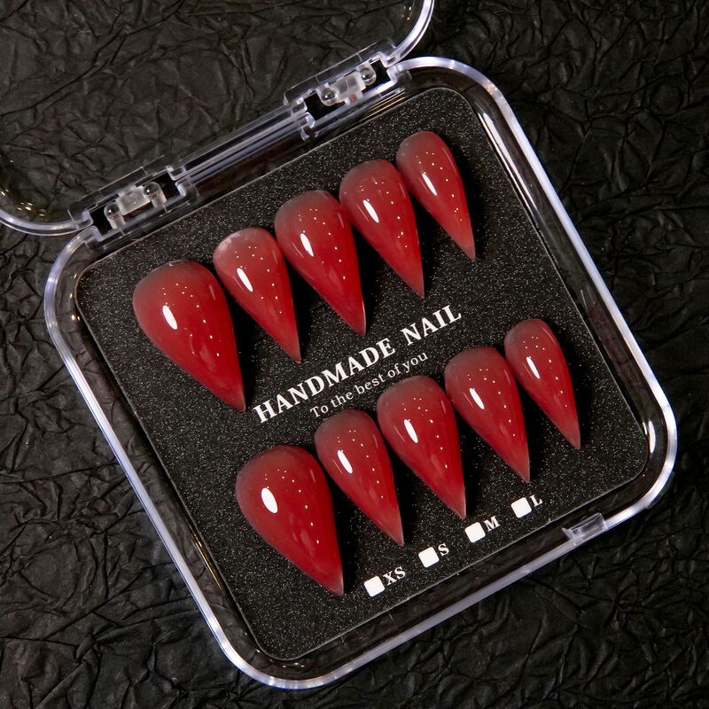 High-end jelly red glitter handmade nail art, transparent wine-red extended pointed nail design, enhancing complexion and creating a sophisticated, mature look High-end jelly red glitter handmade nail art, transparent wine-red extended pointed nail design, enhancing complexion and creating a sophisticated, mature look