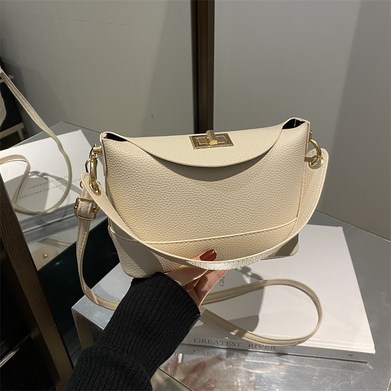 Moda de color sólido litchi 2024, nuevo bloqueo de invierno de estilo exterior de hombro casualidad, bolso de mano pequeño para mujeres