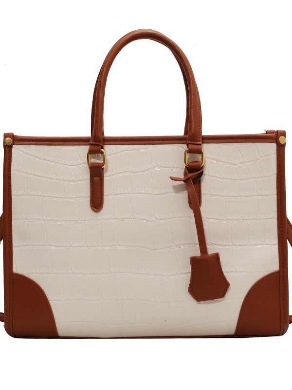 Bolso Tote portátil transfronterizo de gran capacidad para mujer 2025 nuevo modelo retro patrón de piedra contraste bolso de mensajero de hombro de viajero
