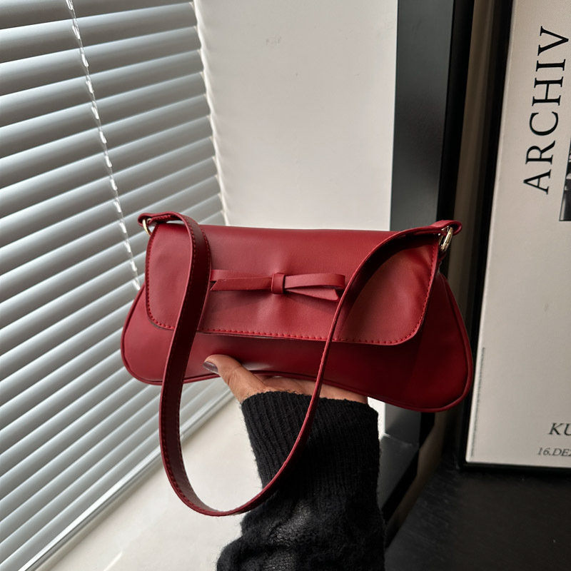 Bolsa de moda francesa de estilo extranjero 2025 primavera nuevo estilo retro nicho diseño popular personalidad mochila de hombro