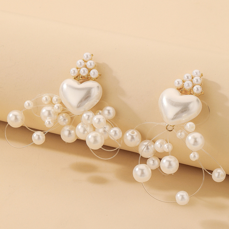 Boucles D&#39;oreilles Ligne De Poisson Coeur Perle Baroque En Gros Nihaojewelry display picture 5