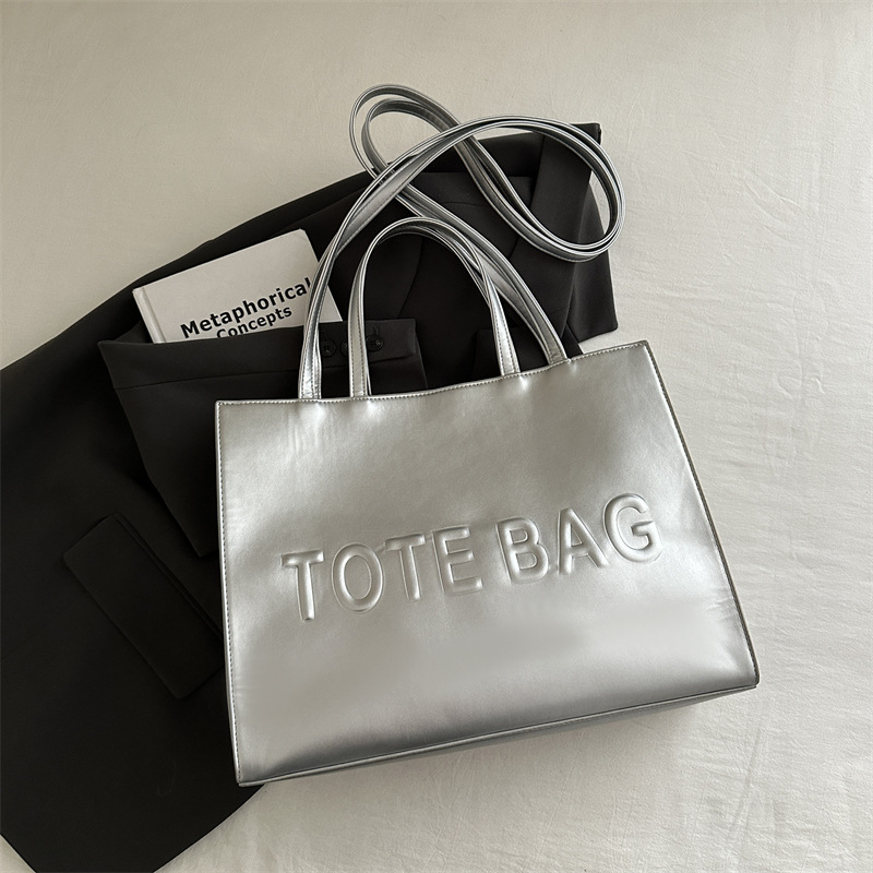 Bolsa de moda coreana de nicho para mujeres 2024 nueva bolsa de clase de estudiantes de gran capacidad, bolsa de hombro universal