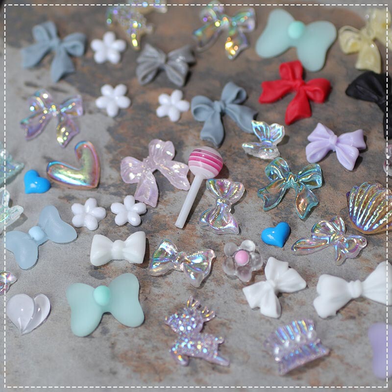 Wholesale of Small Nail Art Accessories: Aurora Bow, Camellia Resin Nail Decorations, Mixed Rhinestones, Luminous Finished Products