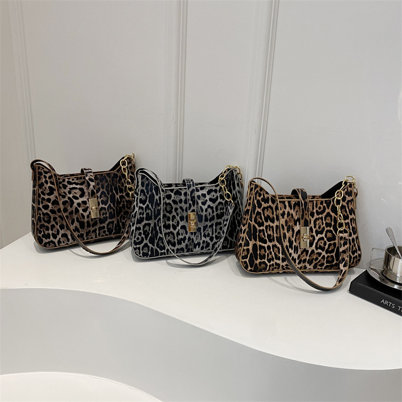 Bolso de leopardo de alto valor de cara nicho de mujeres 2025 nueva moda personalidad bolso de brazo de hombro caliente bolso pequeño