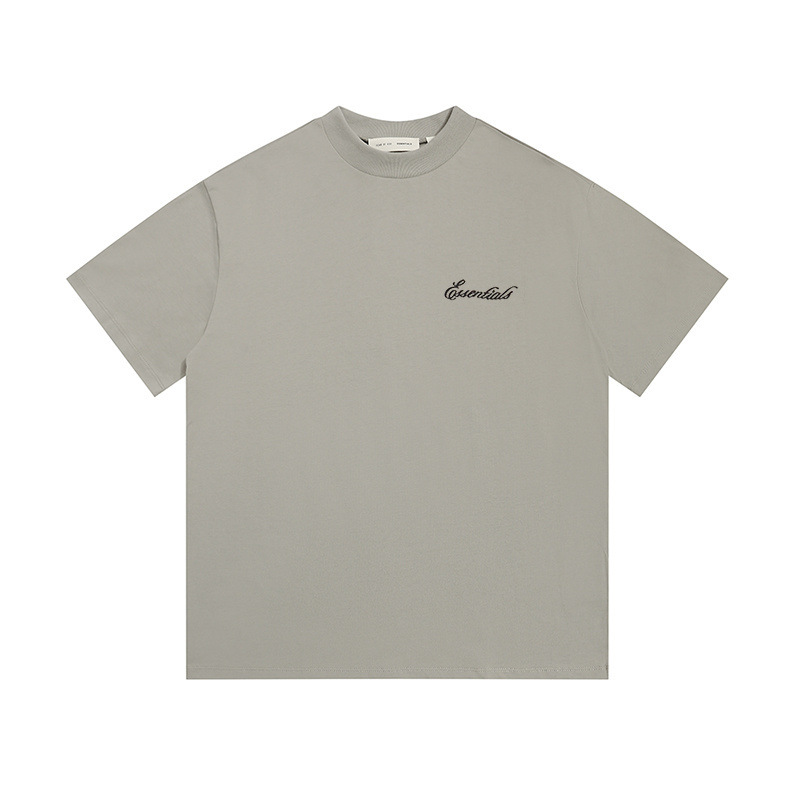 Una pieza de la marca de moda FOG de doble línea ESSENTIALS letra con lema impreso camiseta de manga corta para hombres y mujeres media manga en la calle