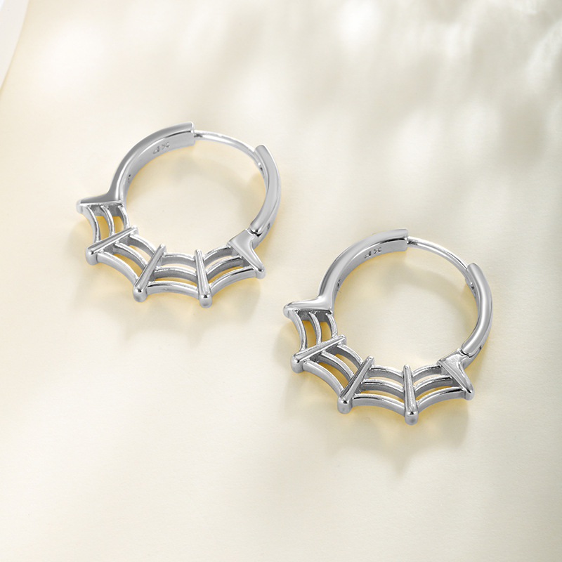 Joyería Xuping Amazon transfronteriza neutral fría aretes de aretes de tela de araña para hombres nicho de alta calidad para mujeres