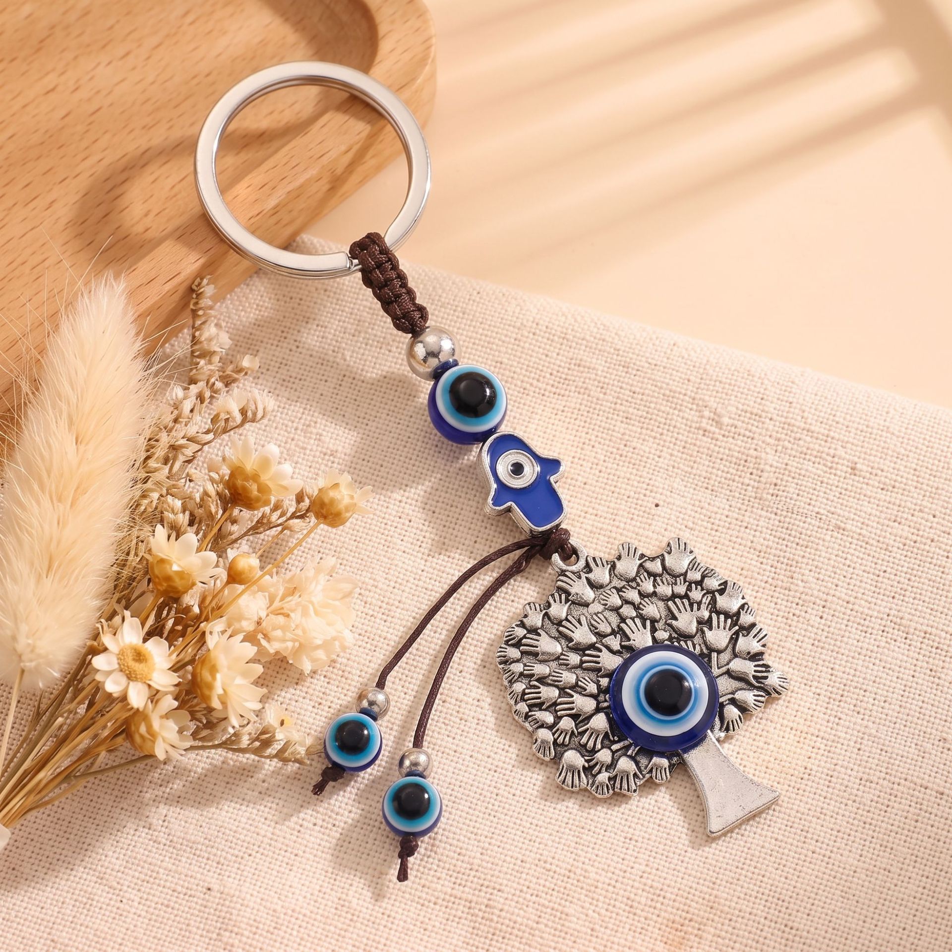 Ventas transfronterizas turcas de ojos azules viento nacional árbol de vida Fátima llavero de aleación de mano bolsos pequeños accesorios