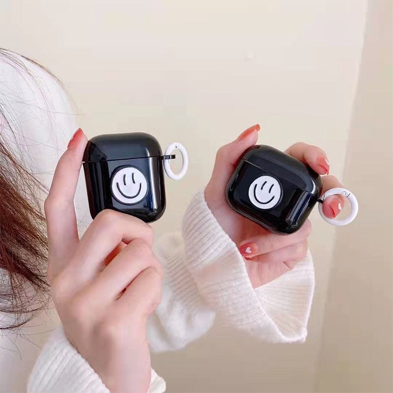 Aplicable a Apple personalidad blanca sonriente suave caso negro AirPods4 caso de auriculares bluetooth 2 generación 3 generación simple moda