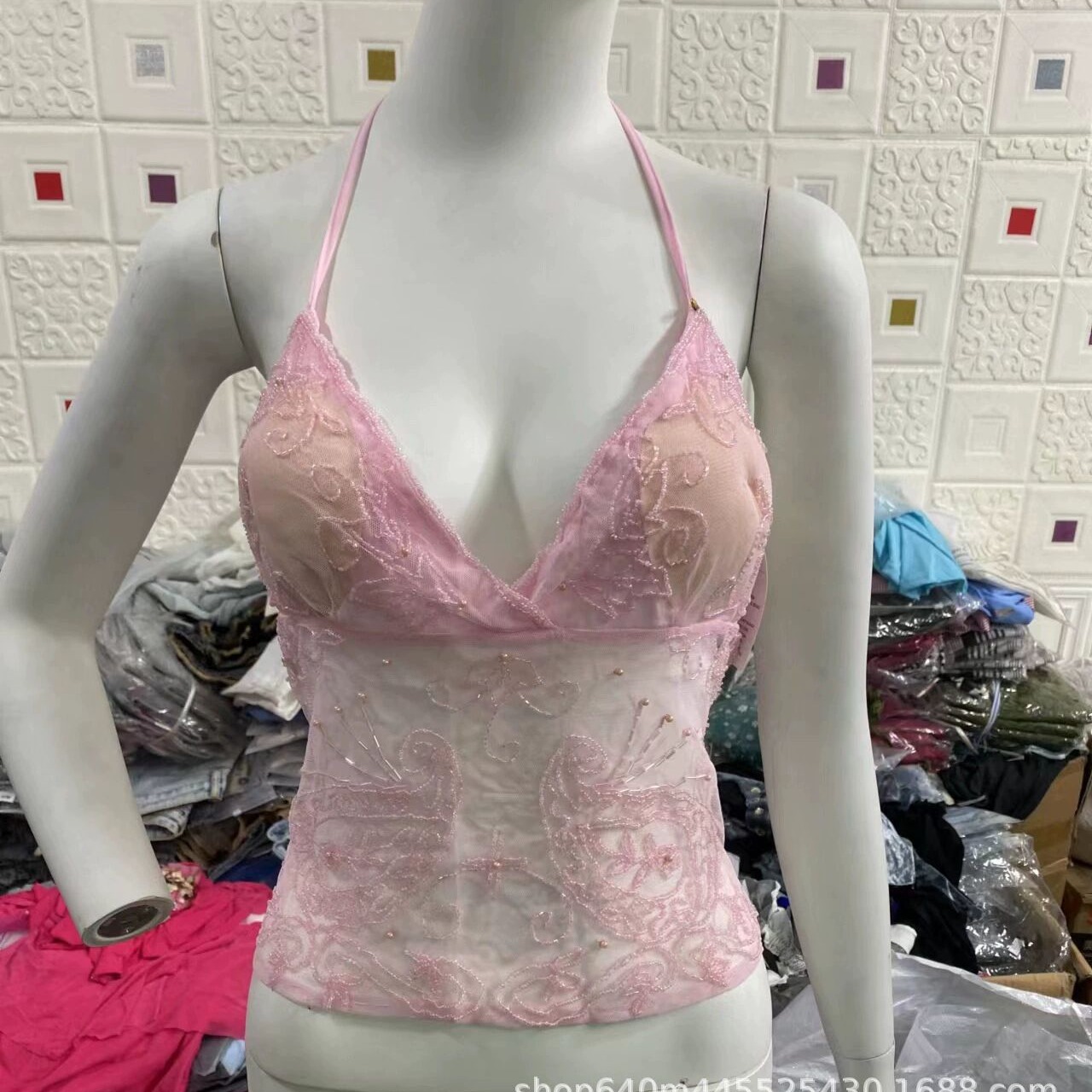 Ropa de mujer de color sólido vestido bajo precio chaqueta de emoción cinturón sexy hueco comercio exterior transfronterizo fuente de mercancías al por mayor