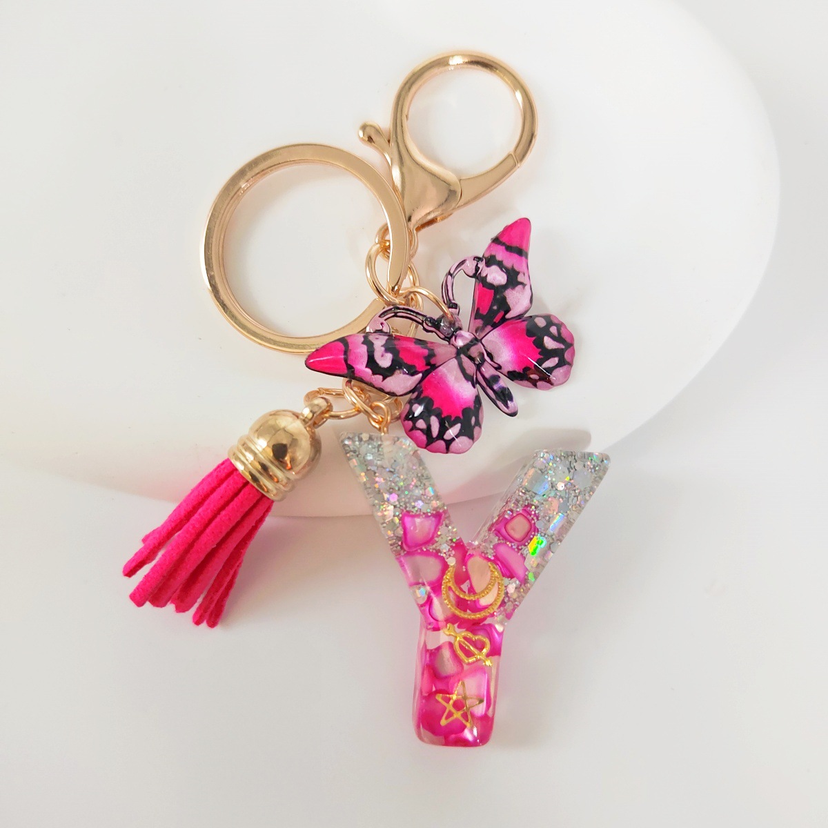 Inventario transfronterizo nueva resina bicolor mariposa borda llavero colgante estrella luna accesorios de joyas