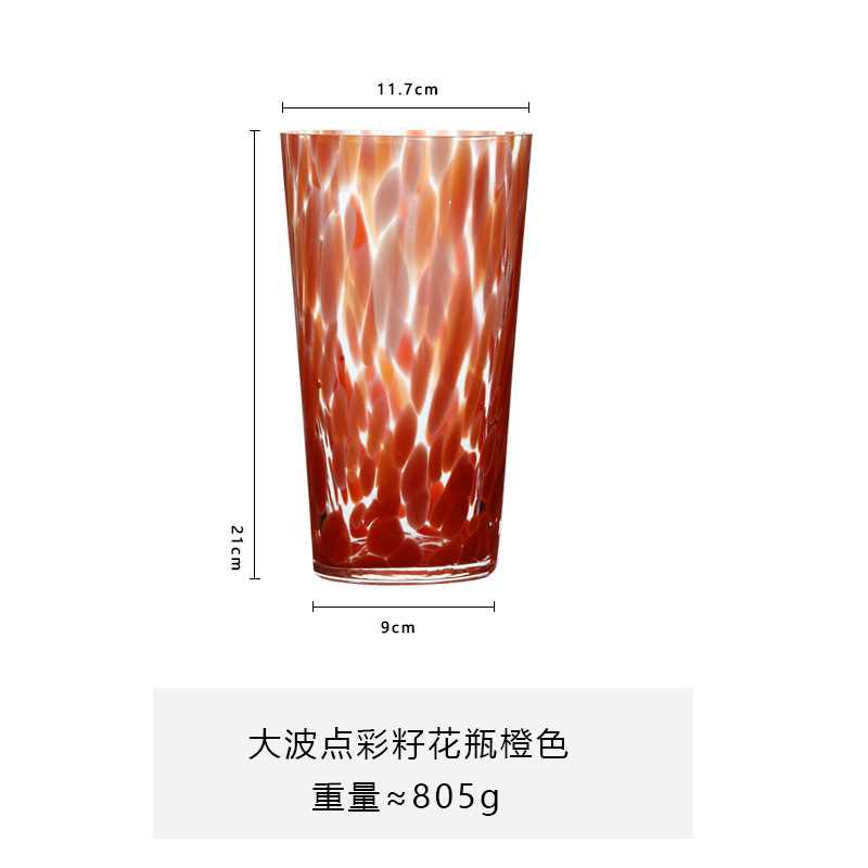 Gran ola de semillas de color punteado naranja