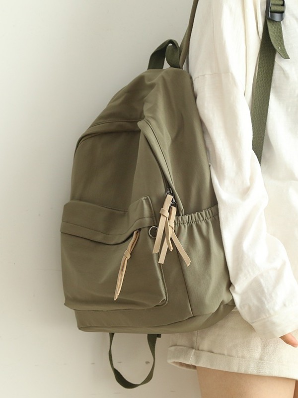 Solid color capacious backpack for traveling for leisure