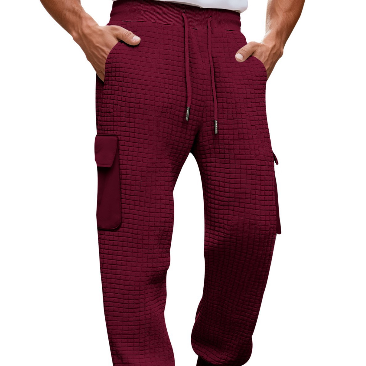 Nuevos pantalones deportivos de hombre de otoño transfronterizos europeos y estadounidenses gruesos pequeños cuadrados herramientas deportivas casuales pantalones de pila