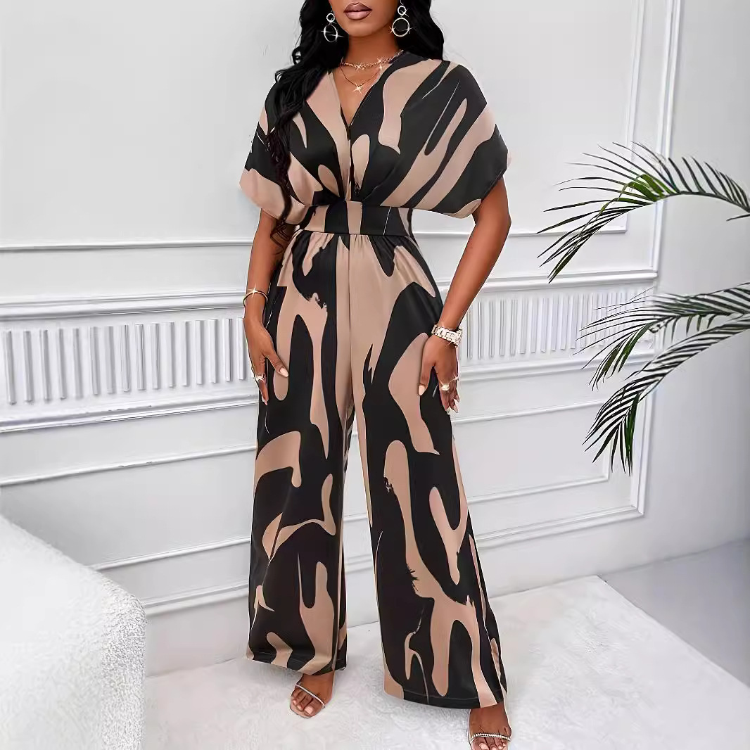 Amazon independent website cross-border e-commerce platform for European and American women's clothing: all-over print batwing sleeve wide-leg jumpsuit with elegant style.
