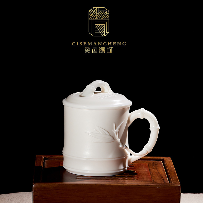 Porcelana color Mancheng Dehua porcelana blanca con tapa filtro oficina con revestimiento de separación taza de agua taza de té grande de cerámica personal