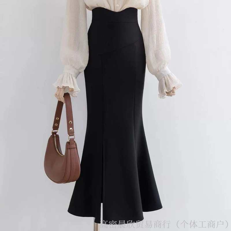 黒い半身のスカートの女性の春と夏の秋の新型の中で長いスカートのタイプのヒップのスカートの職業はスカートを詰めます。|undefined
