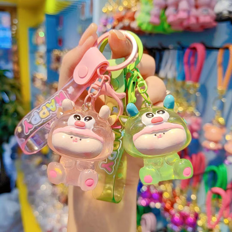 Caricatura Lilith dragón lindos colgantes de resina transparente bolsos de automóviles colgantes de llaves al por mayor