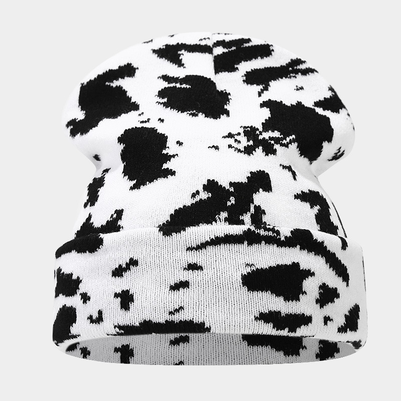 Moda europea y americana Nueva leopardo Jacquard sombrero de punto engrosado cálido hombres y mujeres otoño e invierno Gran circunferencia de la cabeza protección del oído sombrero de lana