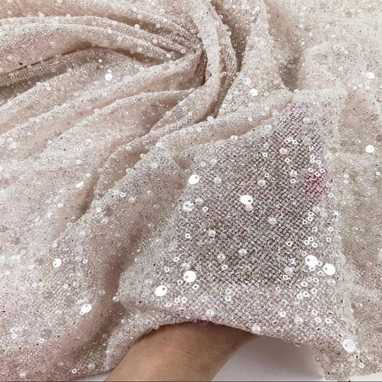 Fabricantes de comercio exterior transfronterizo punto bordado de polvo de polvo brillante tela vestido de boda ropa de moda tela