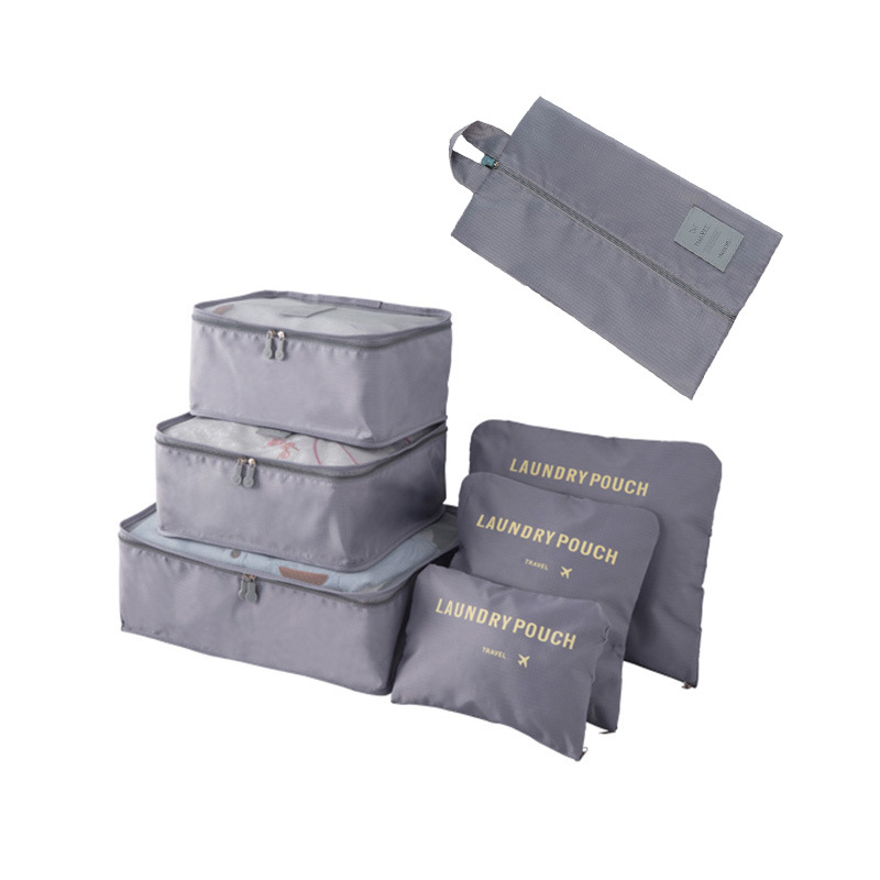 En stock al por mayor de siete piezas de almacenamiento de equipaje viaje de negocios limpio y ordenado de gran capacidad Portátil Bolsa de almacenamiento plegable