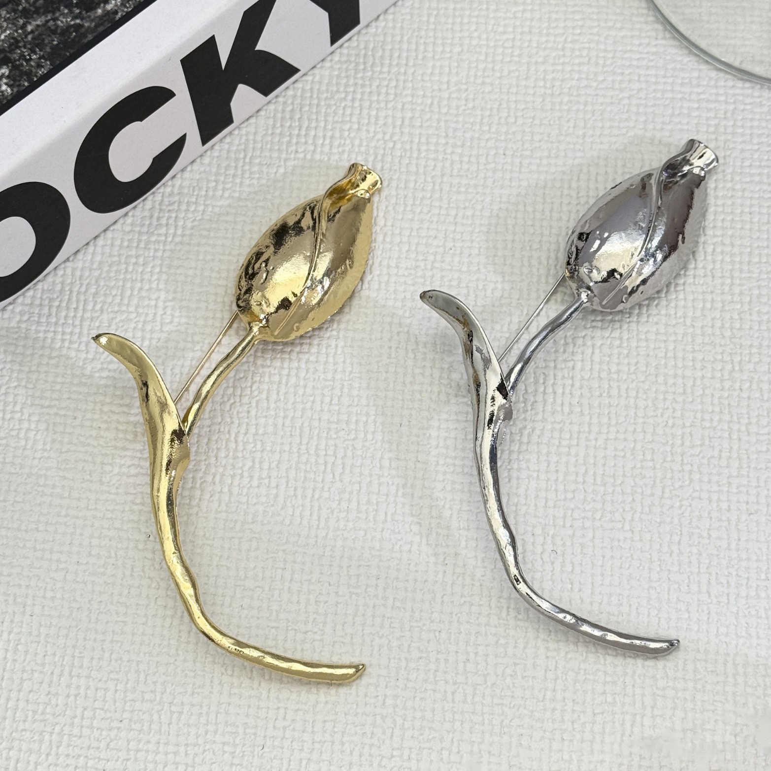 glossy brooch