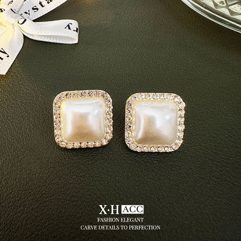 Aguja de plata de moda alta sensación de diamante de goteo de aceite pendientes nicho universal elegante pernos de orejas ligero lujoso temperamento simple orejas para mujeres