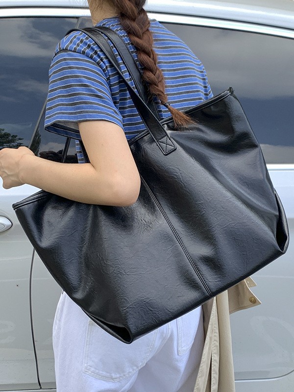 Bolsa de moda retro de gran capacidad para mujeres 2025 nueva simple versátil alta sensación de mochila de viaje diario
