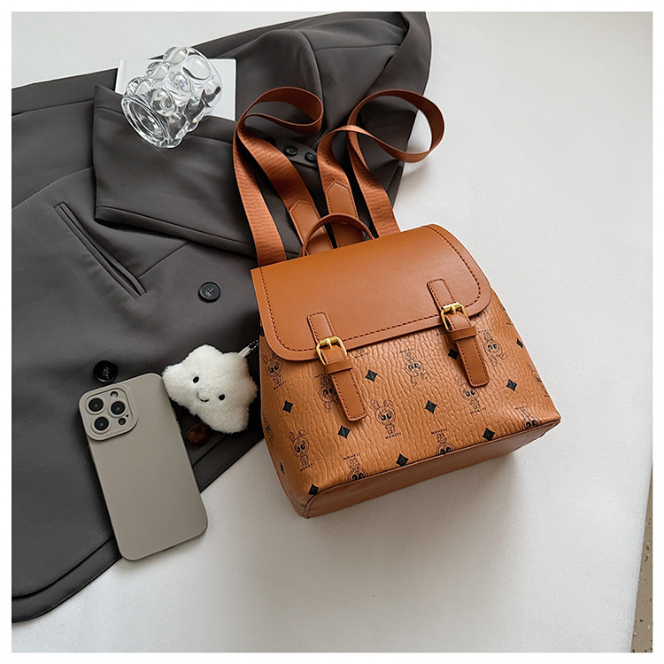 This is a niche design for women, featuring cartoon animal prints. It is a pink backpack with a high level of appearance and large capacity for travel undefined