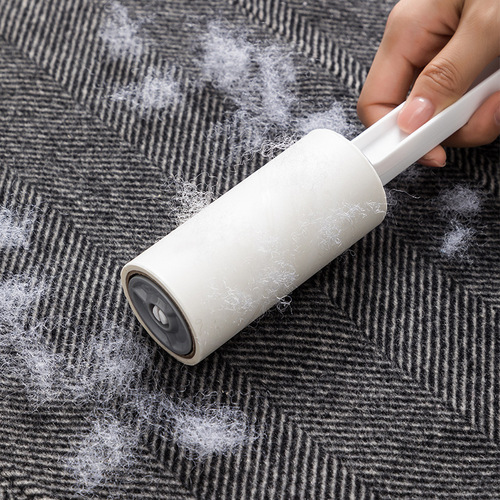 Removable core adhesive roller lint remover for cat hair removal, dehairing, dust removal, and hair ball removal.