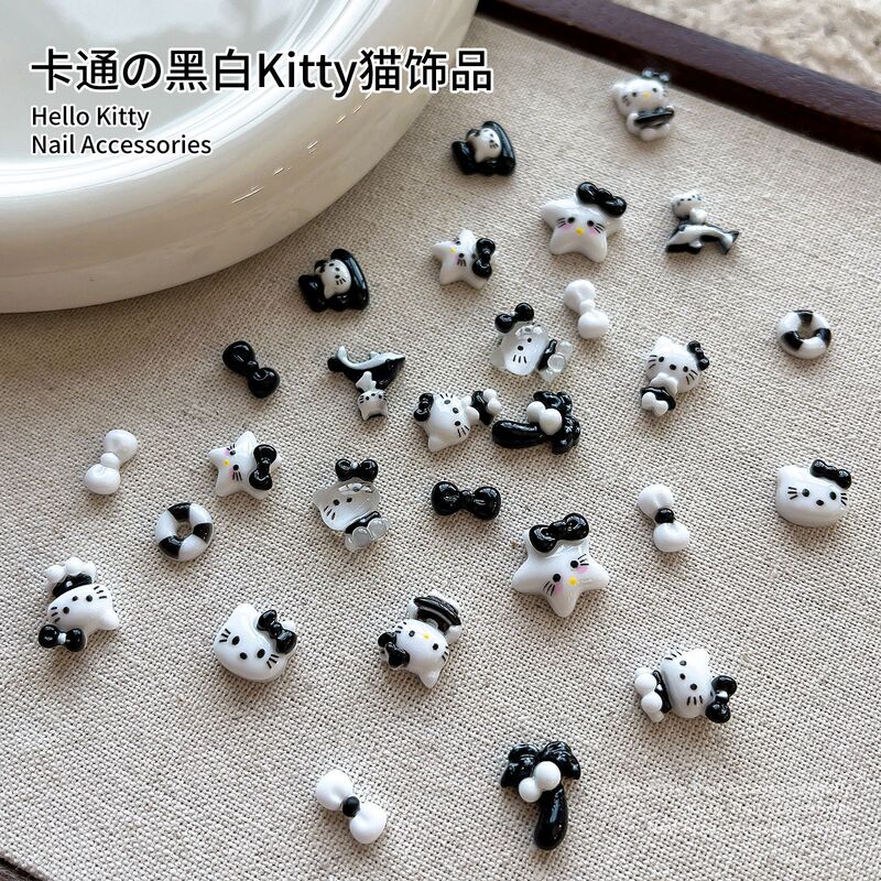 Black and white KT cat nail ornaments exquisite simple Joker cute stars dolphin bow nail ornaments wholesale Black and white KT cat nail ornaments exquisite simple Joker cute stars dolphin bow nail ornaments wholesale