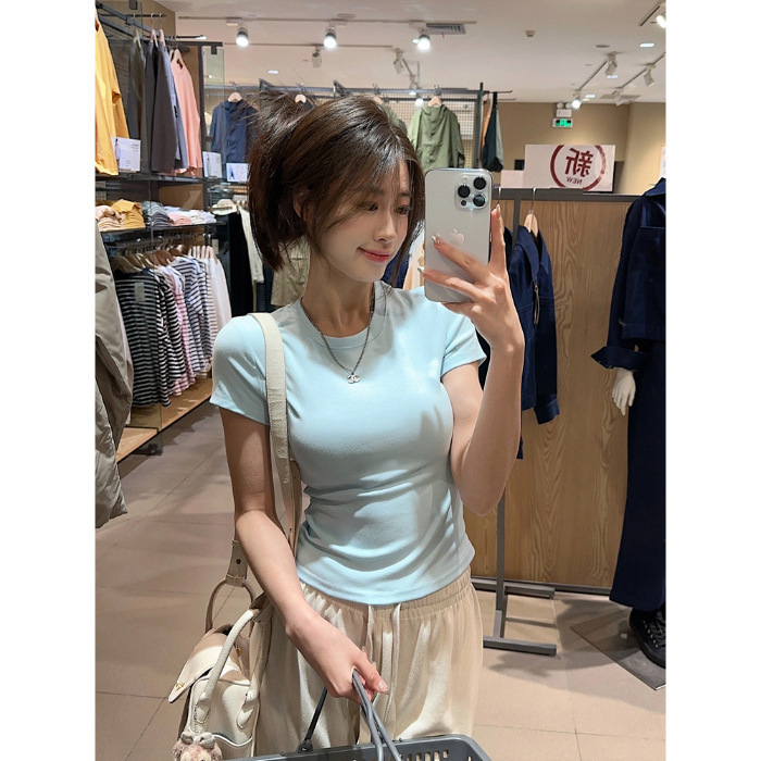 女性用白い半袖ボトムシャツとTシャツ2025新しい夏のスリムフィットホットガールショートショルダートップ