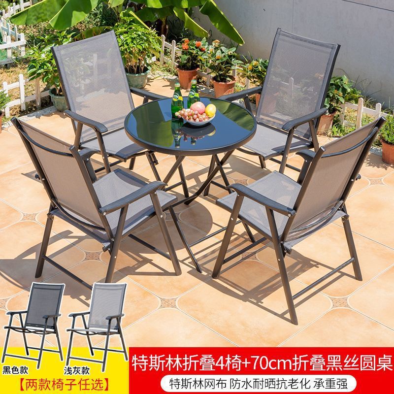 Tesla plegable 4 sillas + mesa redonda de seda negra plegable de 70cm
