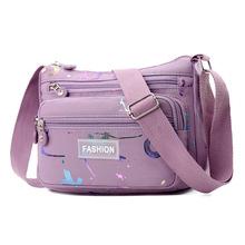 日韩新款手拎中年妈妈包帆布斜挎包百搭印花轻便布包女迷你小包包