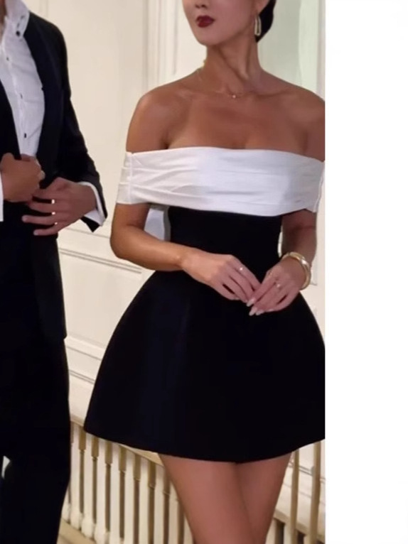 白黒の配色の蝶結びのワンピースは国境を越える欧米の婦人服INSネットの赤い爆発の高級な交差の非対称の女性です。|undefined