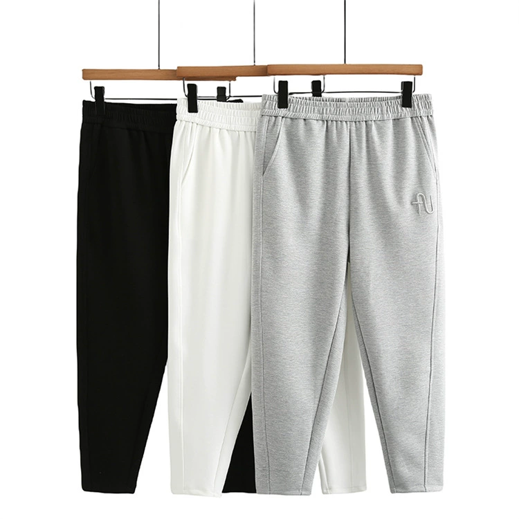 Новые весенние повседневные брюки больших размеров для полных женщин, простые универсальные свободные эластичные брюки-карго с вышивкой 8532