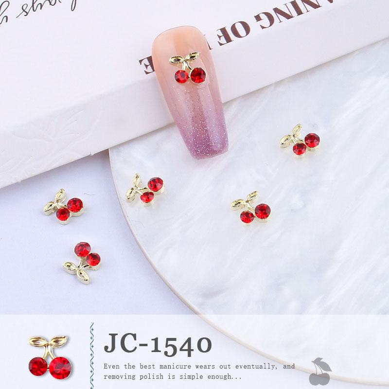 Venta caliente transfronteriza joyería de uñas al por mayor goteo cereza aleación diamante verano lindo fresco Super flash clavo diamante