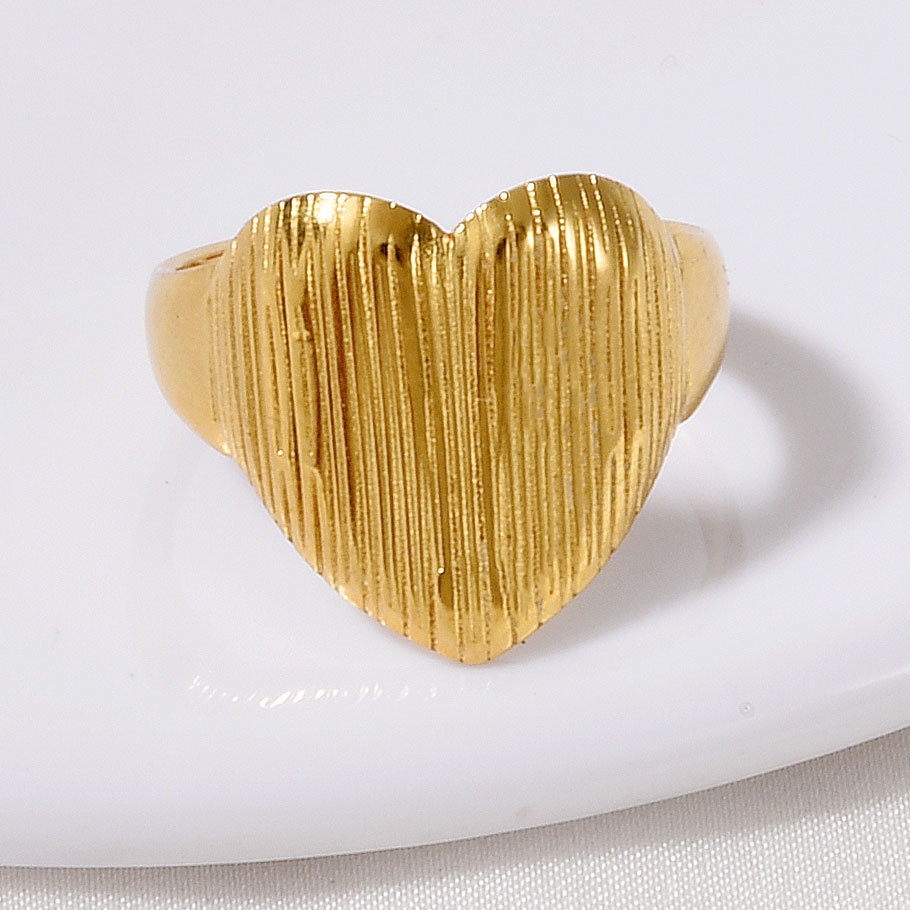 High-end Stainless Steel Couple Ring 18k Gold Hollow Pattern_voghion.com