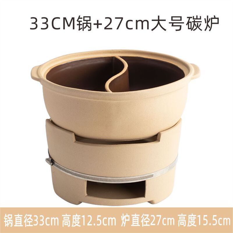 古い陶土オシドリ鍋は辺炉を打って木の炭素のストーブを燃やします。|undefined