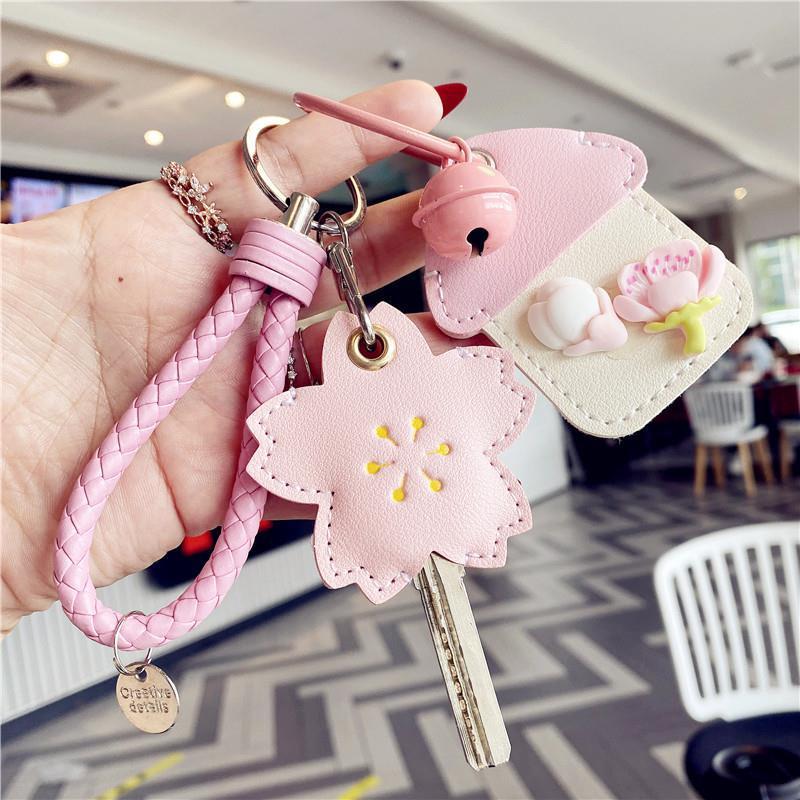 Cubierta de la llave nuevo corazón de niña explosiva Llavero Coche eléctrico PU Cubierta de la tarjeta de control de acceso para el hogar Sensor de gota de agua Amazon