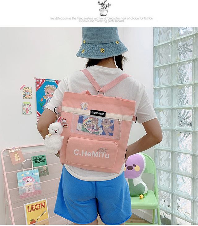 Korean-style canvas bag for girls with one shoulder, in the style of Harajuku, ulzzang, with a large capacity and contrasting colors, is a crossbody hand-held schoolbag for classes undefined