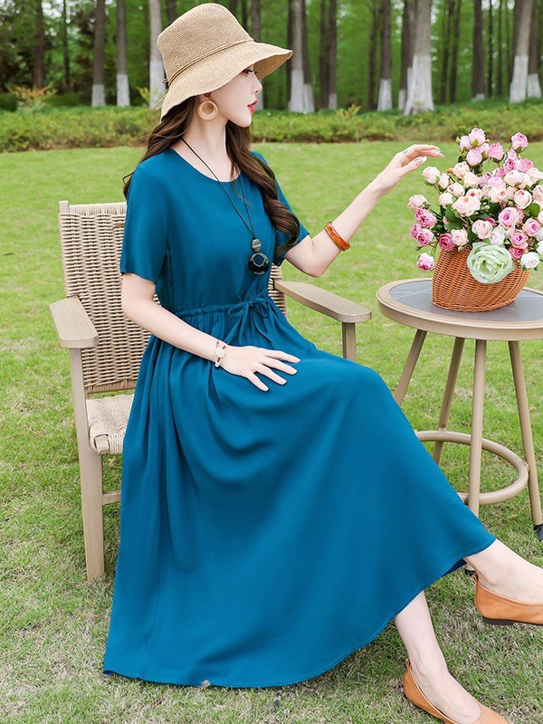 お母さんの端正な大気の夏服の新型の純色の綿のワンピースの中の長い高級な気質は腰を収めてやせているスカートを現します。|undefined