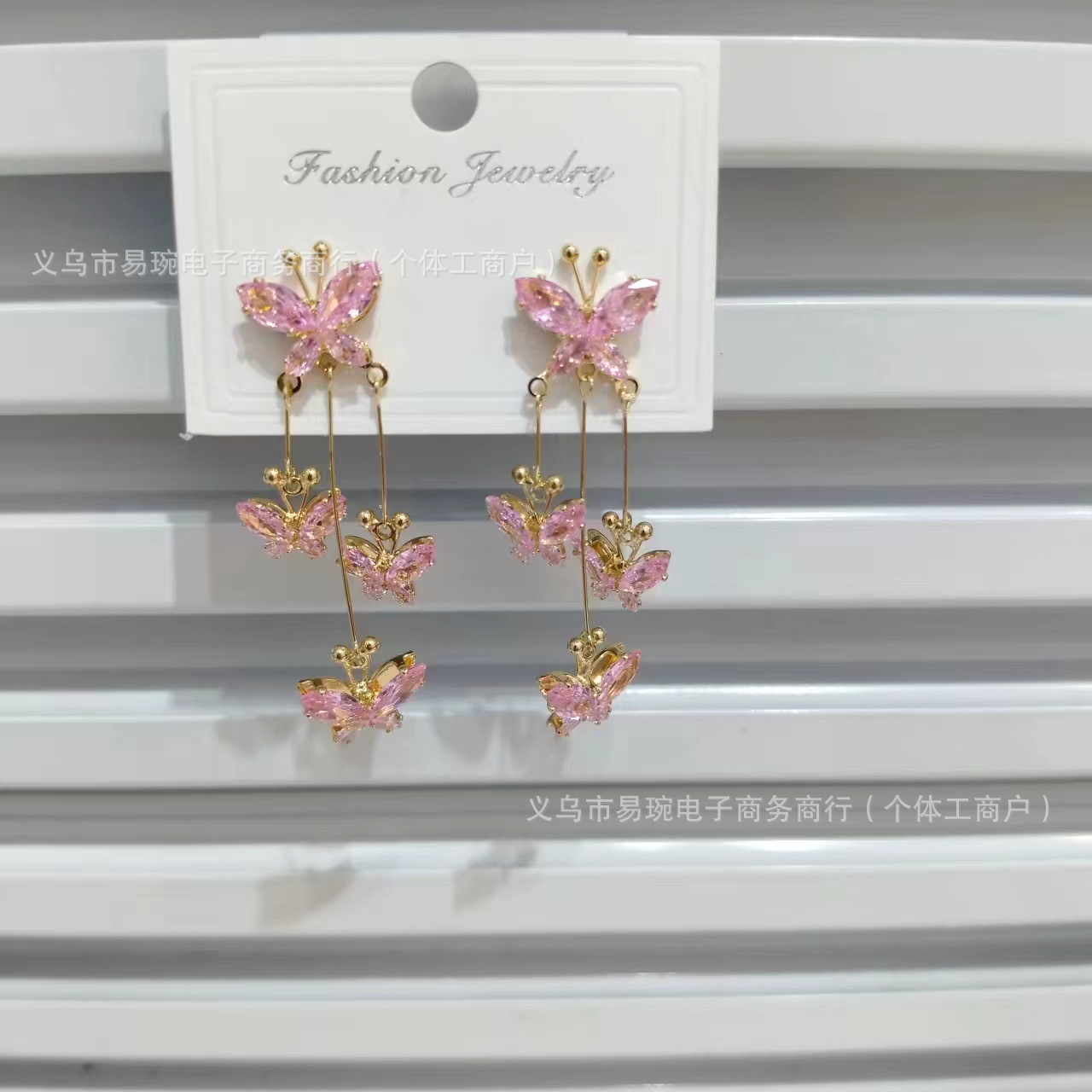 Cute fashionable elegant earrings with tassels with zircon