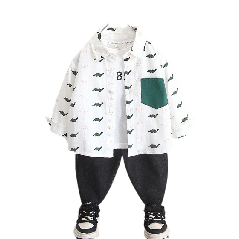 6268 Camisa de dinosaurio de dibujos animados para niños Otoño 2025 Nuevo estilo guapo bebé primavera y otoño Camisa de manga larga para niños