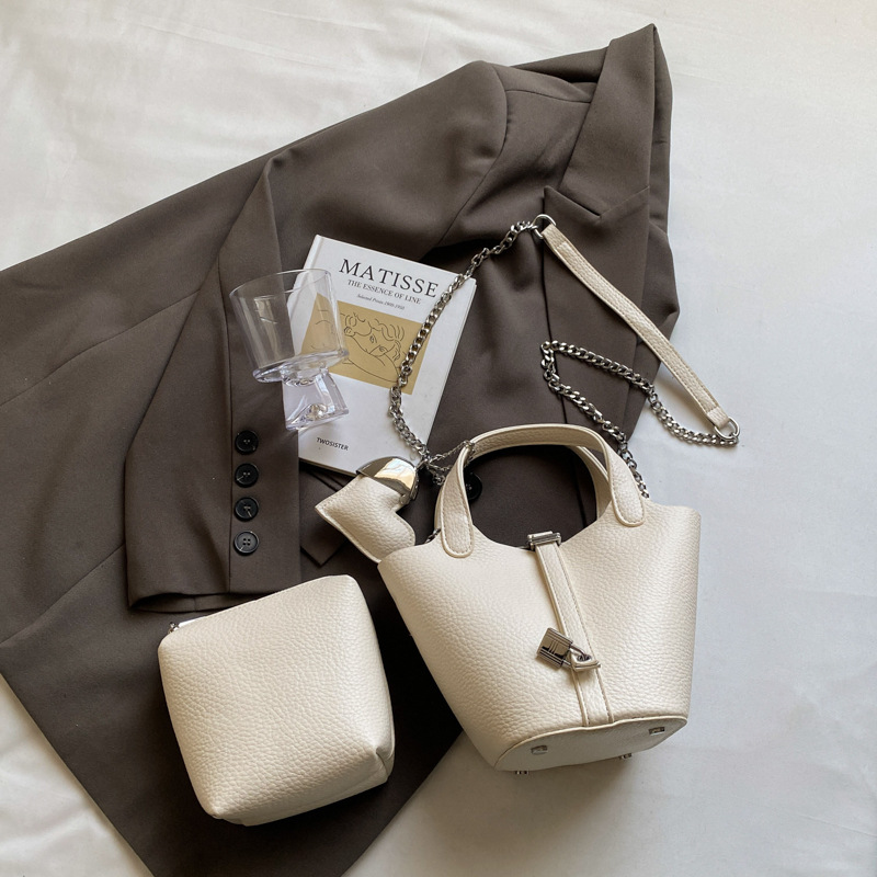 Bolso de madre de cubo de ocio simple para mujer 2025 versión coreana del nuevo bolso de mensajero exquisito de textura de moda ins