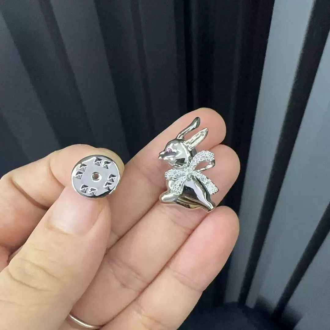 Xuping nuevo estilo de moda humano artificial gemas arco pequeño conejo delicado broche adorable accesorios de ropa al por mayor