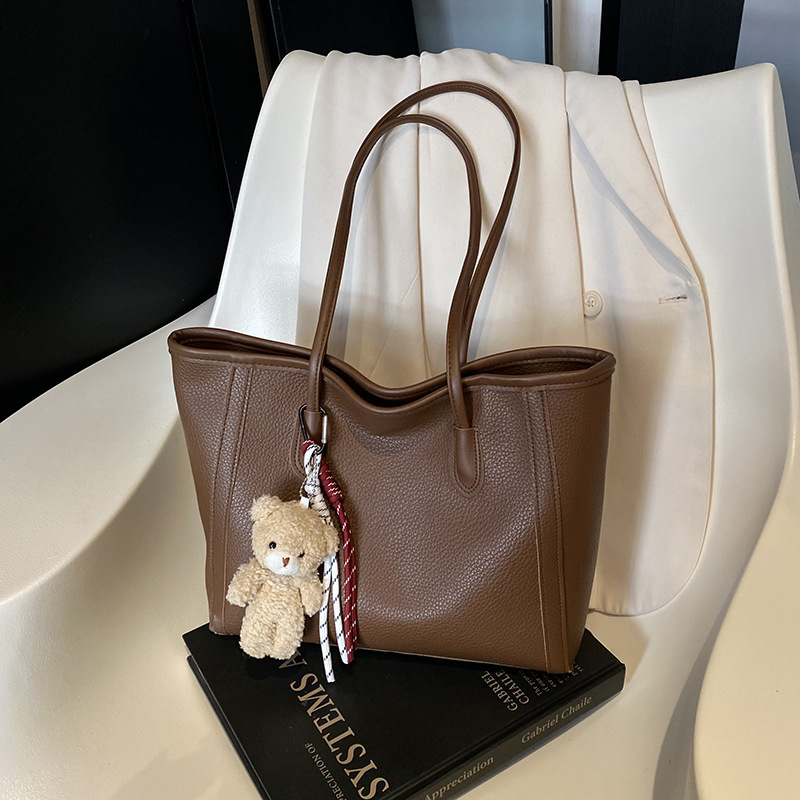 Bolso atmosférico de textura de viajero 2025 nuevo estilo de contraste de color de moda versión coreana de un solo hombro bolso de axila temperamento bolso de moda