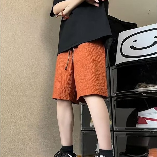 Pantalones cortos de secado rápido a cuadros de burbujas para hombres verano nuevo estilo pantalones de playa de color sólido tendencia americana pantalones delgados de cinco puntos