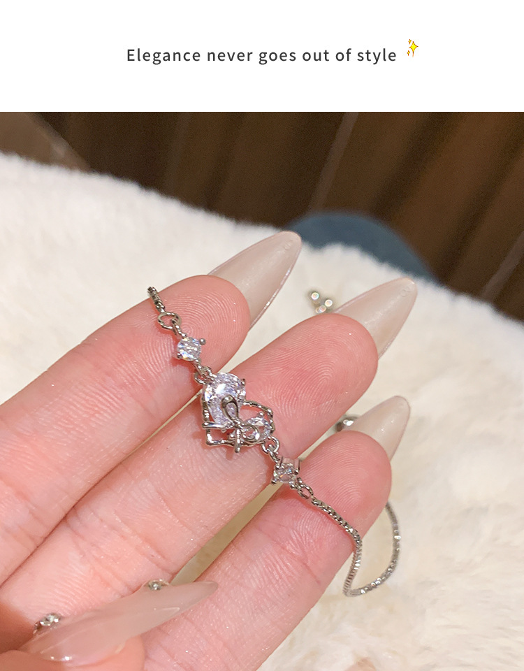 Wholesale of 2024 new asymmetrical diamond-encrusted heart-shaped bracelet for women, a fashionable, niche and high-end pull handle bracelet pic 28
