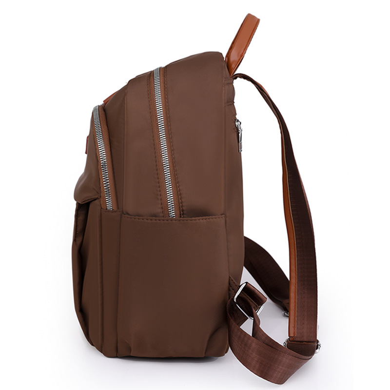 Bolsos para mujer 2023 nueva mochila casual para mujer de nailon moda todo fósforo color de contraste mochila ligera mochila escolar al por mayor